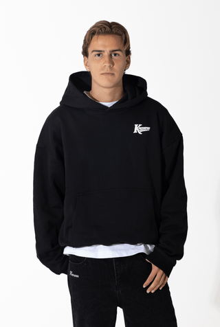 KENZEN essential hoodie Black – stílhrein íslensk hettupeysa fyrir líkamsrækt, yoga og daglegt líf.