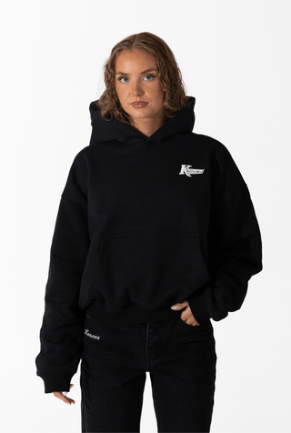 KENZEN essential hoodie Black – stílhrein íslensk hettupeysa fyrir líkamsrækt, yoga og daglegt líf.